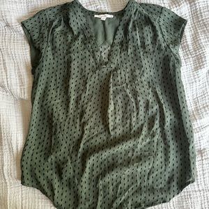 Green polka dot blouse
